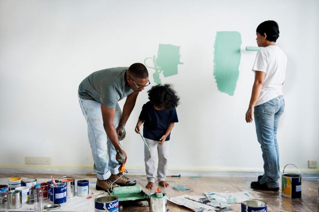 Family painting living room